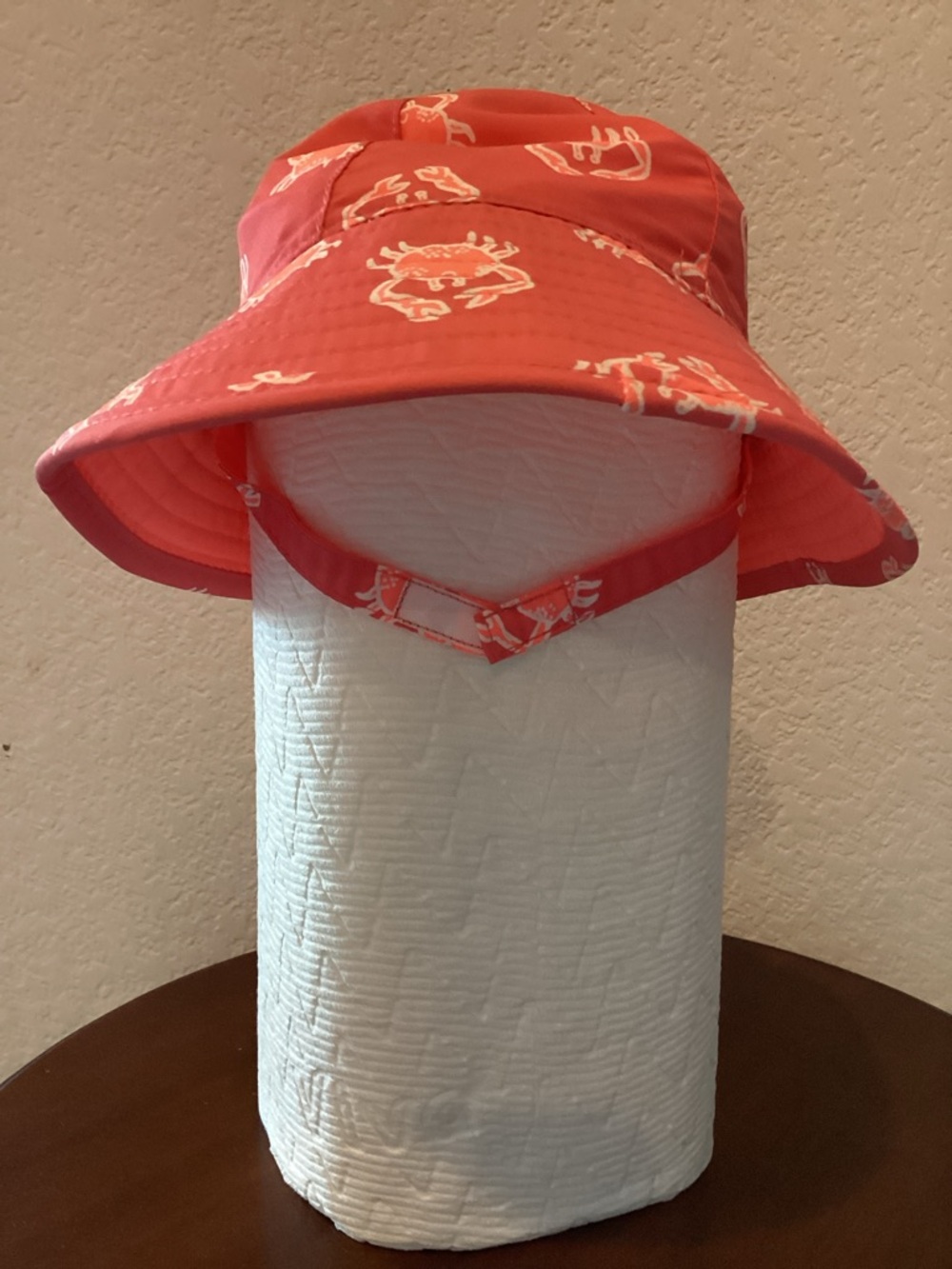 Crabs Bucket hat, no size on hat, but seems like a 12 month size